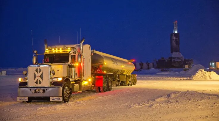 Alaska's Thriving Ice Road Oil Trucking Industry Sparks Controversy