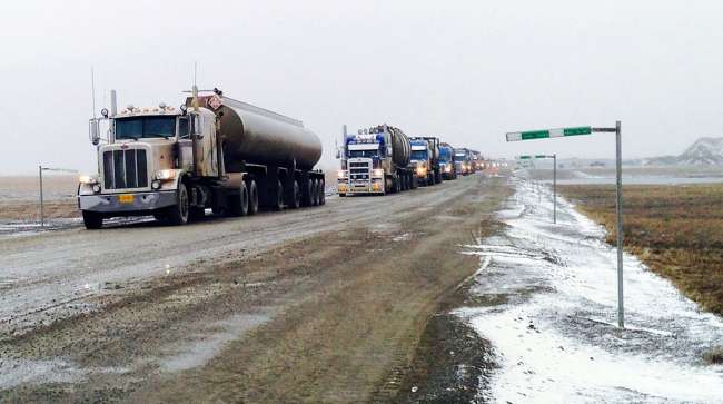 Alaska's Thriving Ice Road Oil Trucking Industry Sparks Controversy